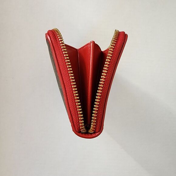 Coach Long Accordion Zip Around Wallet In Signature Canvas With Maroon Accent - Picture 9 of 10